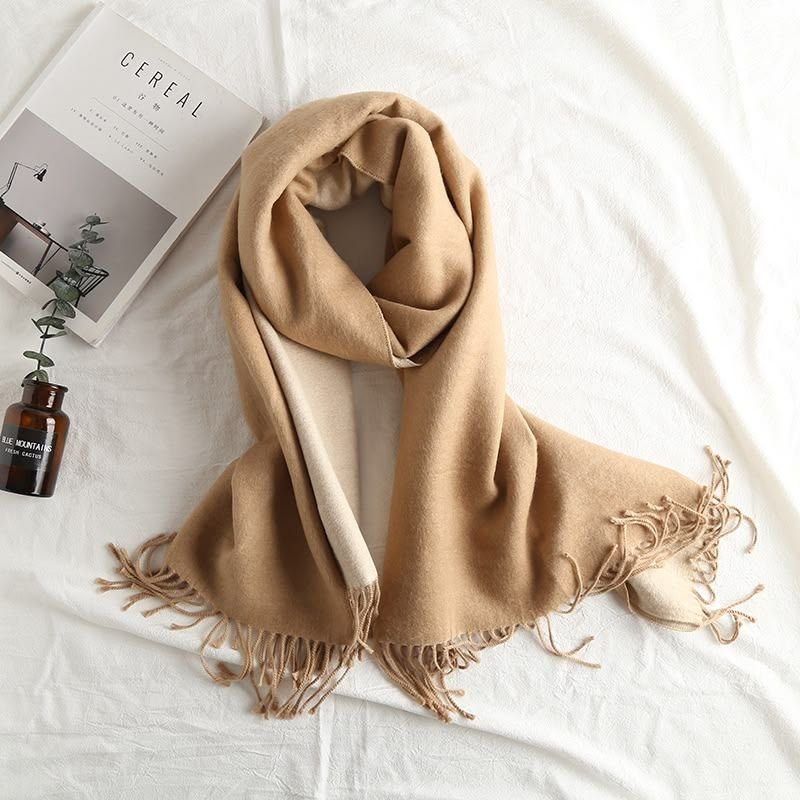 Folded camel cashmere scarf with tassels — specialist scarf and shawl cleaning Sydney
