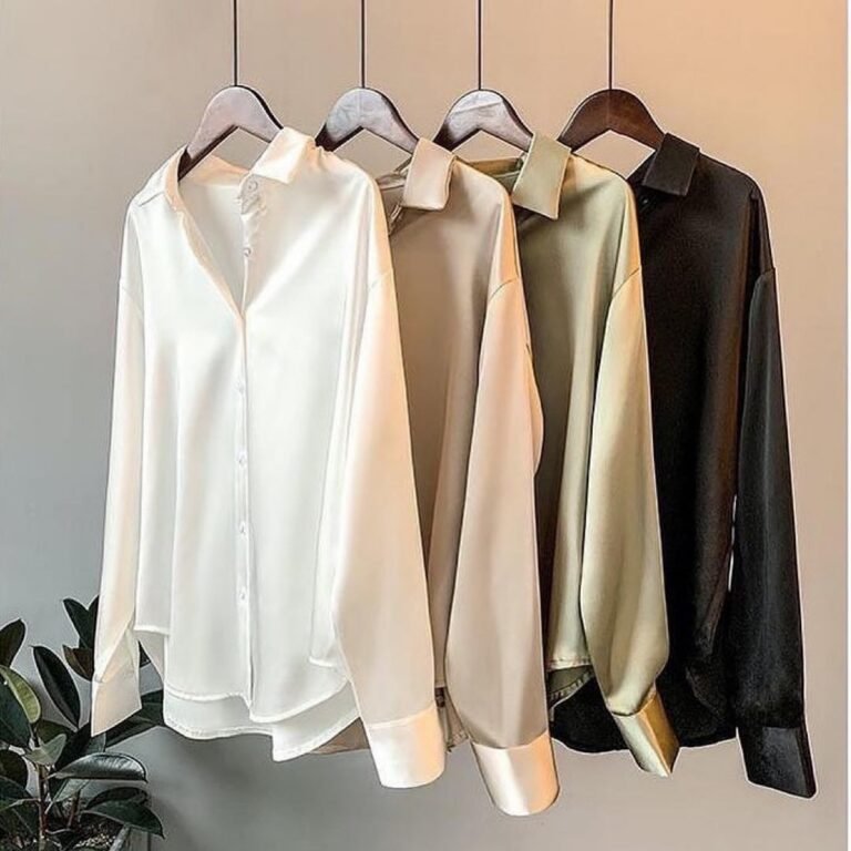 Satin silk blouses on hangers — luxury silk blouse dry cleaning in Sydney