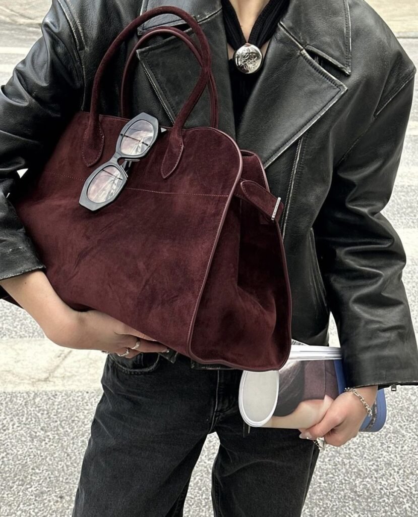 Burgundy suede and leather pieces awaiting specialist care — suede and leather cleaning Sydney
