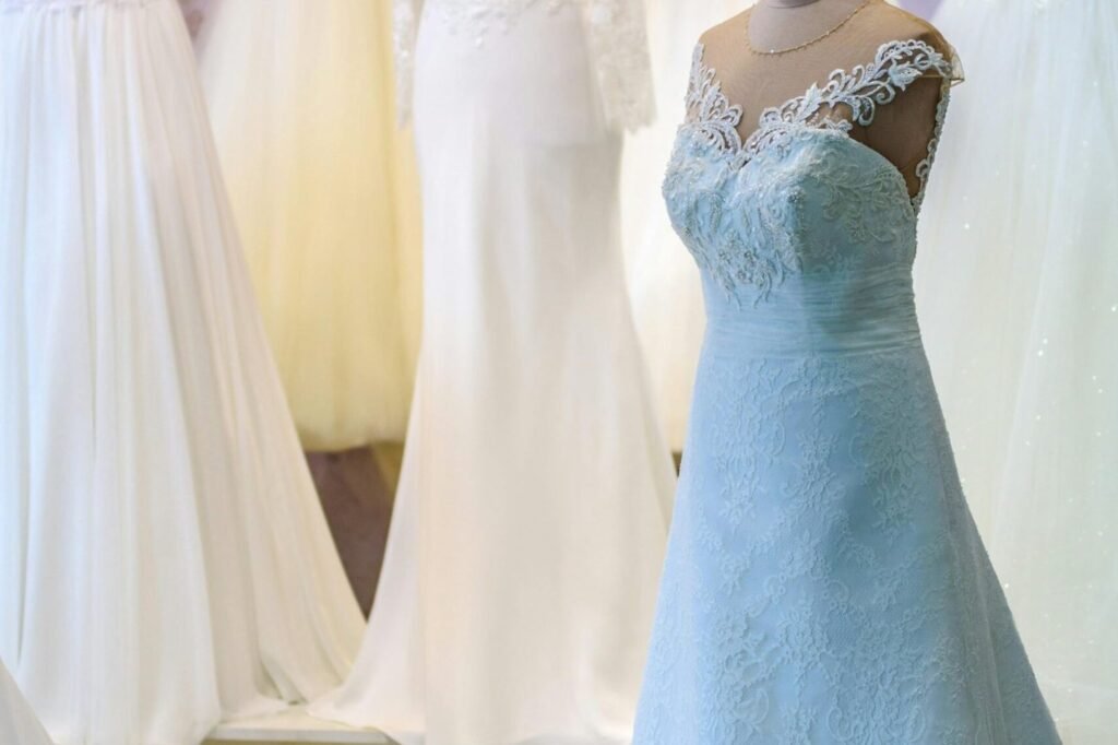 White and pale blue gowns on dress forms — occasion dress dry cleaning Sydney